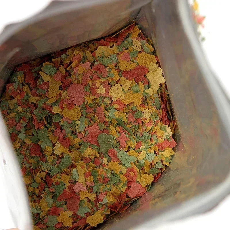 100g/packSmall Tropical Ornamental Fish Feed Aquarium Fish Thin Slice Feed Fish Feed Seedling Growth Food Family Fishing Tools